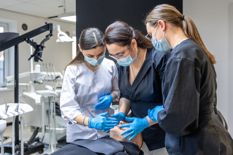 dentist preparing patient for bone graft for tooth implant